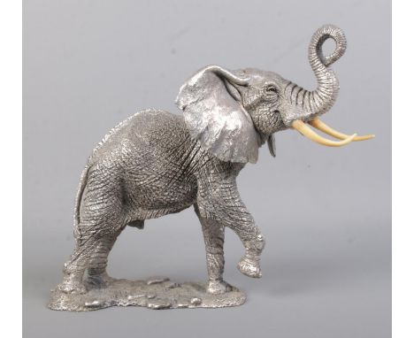 A detailed silver filled model of an African Elephant, by Country Artists, set on naturalistic base. Assayed for Birmingham, 
