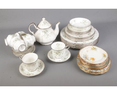 A Paragon "First Love" dinner service including dinner and side plates, teapot, cups and saucers etc with a small amount of o