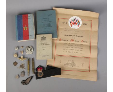 A good collection of military collectables to include two silver cap badges (Air Raid Precautions and Royal Army Reserves, 15