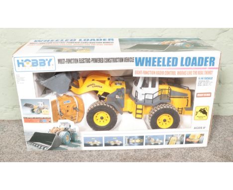 A Hobby Engine 1:14 scale radio controlled model 'wheeled loader no. 0806 boxed.  boxed but untested