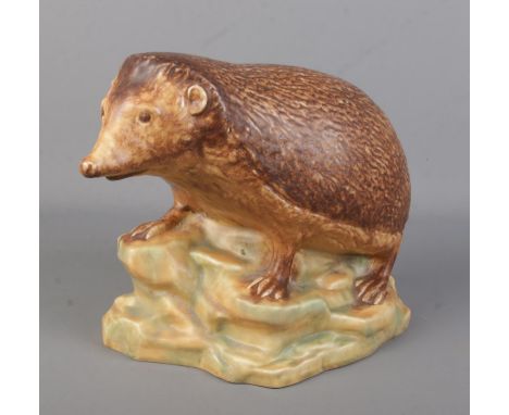 A large Goebel ceramic hedgehog. Impressed number 35 102-24 to base. Height 24cm.  
