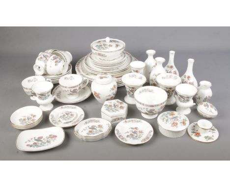 A large quantity of Wedgwood Kutani Crane ceramics including cups and saucers, ginger jar, trinket boxes, vases, candle stick
