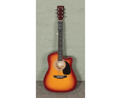 An Encore semi acoustic guitar, model no ENC165EAR.  