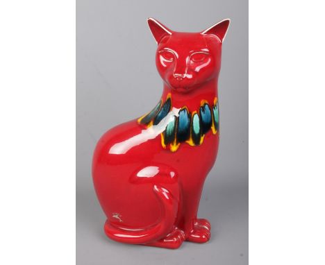 A Poole Pottery figure of a cat in the red Delphis pattern. Approx. height 29cm.  