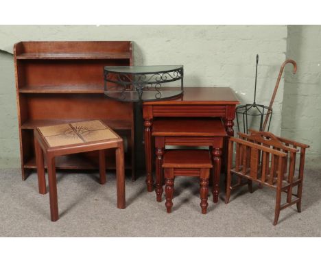 A collection of assorted furniture, to include open front bookcase, nest of three tables, G-Plan tile top table, magazine can