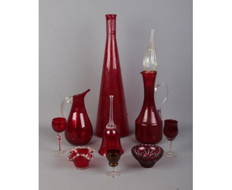 A collection of ruby and red coloured glassware. To include large vase, small goblet with twisted stem and cut glass trinket 