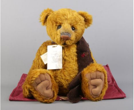 A limited edition Charlie Bears jointed teddy bear, Jonah, from the Isabella Collection. Number 165/350. With scarf and cardb