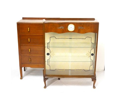 1950's WALNUT GLAZED DISPLAY CABINET
with inset 'Smiths 30 Hour' clock to upper front, above two sliding glass doors with she