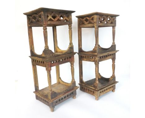 PAIR OF EAST ASIAN HARDWOOD DISPLAY STANDS
with square tops above a pierced lattice frieze with turned front supports, a cent