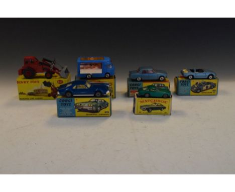 Four vintage 1960's corgi toys diecast model cars comprising of 471 Smiths-Karrier mobile canteen, 252 Rover 2000, 318 Lotus 