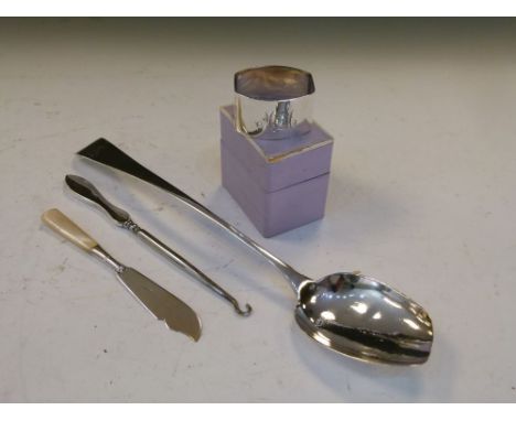 Assorted silver comprising: George III silver tablespoon, London 1801 (bowl reduced), silver napkin ring, button hook or boot