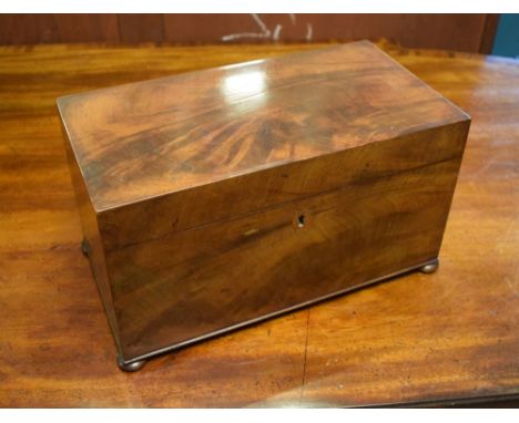 19th Century flame mahogany rectangular tea caddy, the hinged cover revealing cut glass sugar bowl and two hinged cover tea c