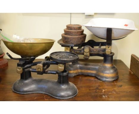 Set of late Victorian/Edwardian grocer's scales with enamel pan on green-painted base, together with selected weights  