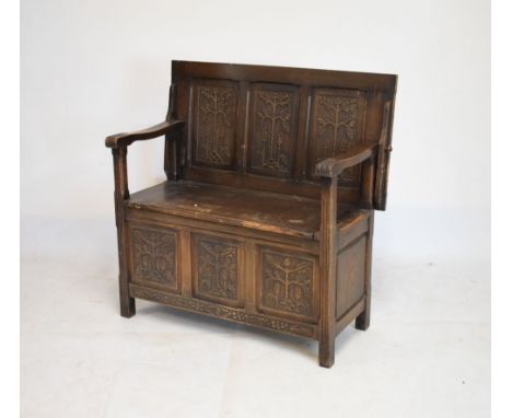 20th Century stained beech and oak monks bench having folding back/top and box seat, 100cm wide  