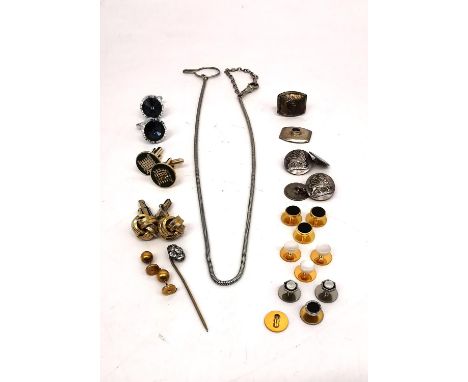 A collection of gentlemen's accessories, including a pair of silver and black star sapphire cufflinks (one back has broken of