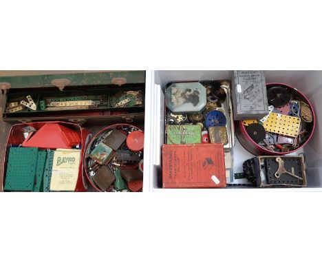 A quantity of vintage Meccano including boxed clockwork and electric motors together with a tin of  Bayko Building Set parts 