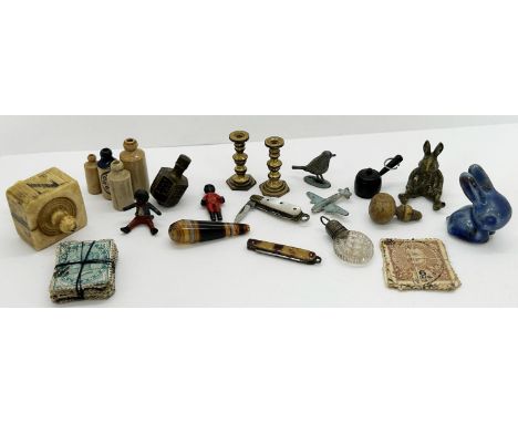 A quantity of tiny objects, owl lapel badge, enamel easel shaped photo frame, bench with hat and brolly detail, veteran car, 
