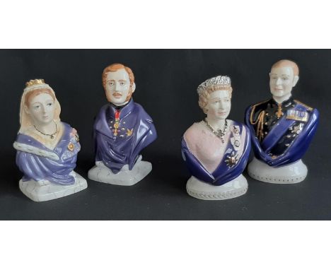 Four Royal Worcester candle-snuffers including Queen Victoria, Prince Albert, Queen Elizabeth II, and the Duke of Edinburgh, 