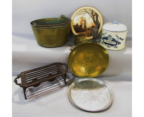 A vintage brass jam pan with a wrought iron handle 30cm diam, together with a wrought iron pan warmer, three metal plates, a 