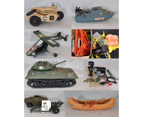 A large collection of vintage Action Man vehicles and toys including 105mm Light Gun with instructions, Tank, Training Tower,