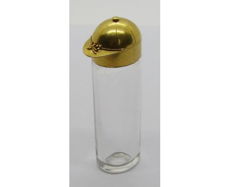 Of horse racing / equestrian interest: A novelty French gold and rock crystal perfume / scent bottle, the hallmarked 18ct gol