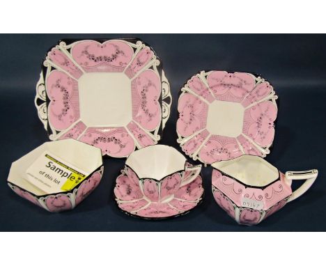 A Shelley Garland of Flowers Queen Ann shaped tea service for 12 in a pink, black and white colourway, 12 cups, twelve saucer