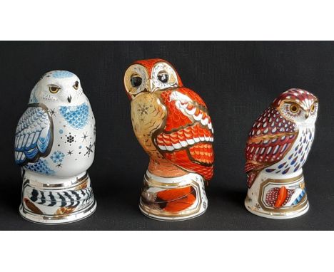 Three Royal Worcester Candle Snuffers comprising Tawny Owl, Little Owl and Snowy Owl, all in original boxes, tallest is 11.5c