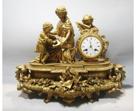 A Victorian romantic style mantle clock in spelter with later painted finish, with eight day striking timepiece surmounted by