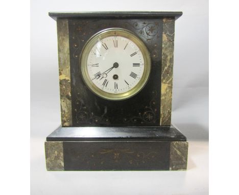 A Victorian black slate and marble mantle clock with eight day timepiece 