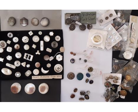 An interesting collection of buttons from mid 19th to mid 20th century including a card mounted display of Mother of Pearl bu