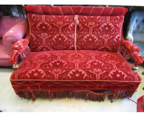 A Victorian two seat parlour room sofa with original upholstery, in an Art Nouveau style raised on turned supports, 150 cm wi