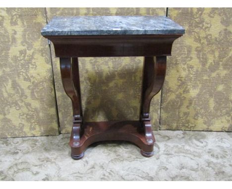 A small mahogany console/pier table with loose rectangular marble top over a frieze drawer and scrolled supports set on a sha