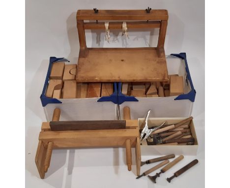 Traditional wooden book binding equipment including book press, stitching frame, rounding blocks, finishing tools etc (displa