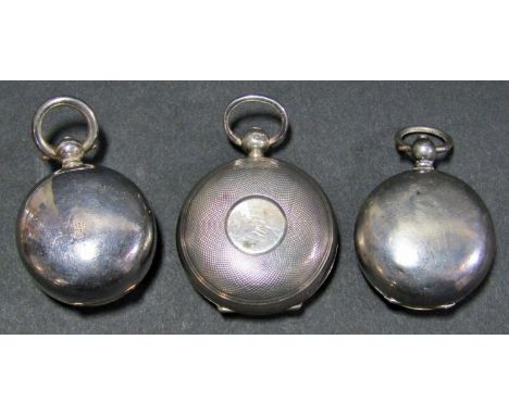 Three silver sovereign cases, a gold plated sovereign case and a compass incorporating a magnifying glass 