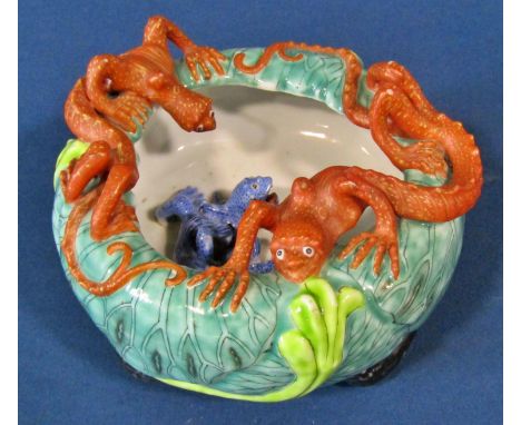 Chinese tripod-form pot, Republic period, with three moulded chilong in iron-red and blue, moulded and over-glazed leaf form 
