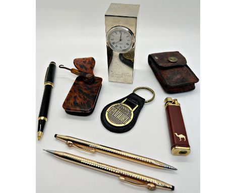 A Waterman ballpoint pen in black with gold coloured mounts, cased, a Cross gold plated ballpoint pen and propelling pencil, 