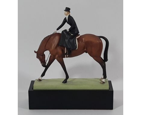 Royal Worcester figure 'At the Meet' modelled by Doris Lindner, marked 3114 to base. Height 19cm excluding plinth 