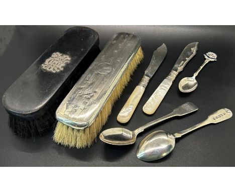 A pair of silver bladed mother of pearl fish knives, a pair of teaspoons, a Bath souvenir spoon, a silver backed brush and an