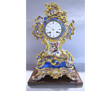 19th century French porcelain mantle clock in a flamboyant blue and gilt case and stand with further painted botanical scene 