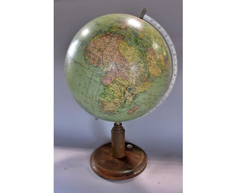 A mid 20th century schools world globe on an oak stand incorporating a small compass, 53 cm high 