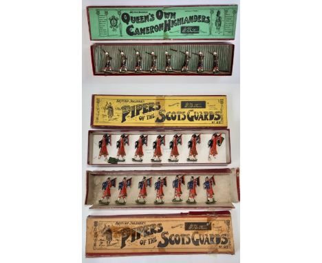 Three sets of Britains Scottish Soldier figures comprising set 114 Queen's Own Cameron Highlanders and 2 x set 69  Pipers of 