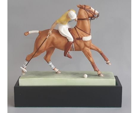 Royal Worcester model, The Polo Player, modelled by Doris Lindner, marked 3163, with plinth. Height 21.5cm 