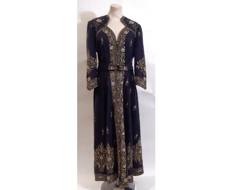Vintage ladies embroidered tailored robe with fitted bodice with heart shaped neckline, button front and belt. Fabric is navy