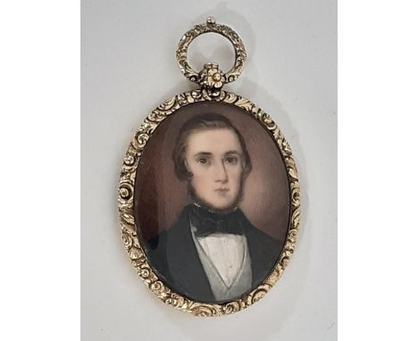 A 19th century portrait miniature on ivory, study of a gentleman, in black tie and dinner jacket, in a tooled yellow metal fr