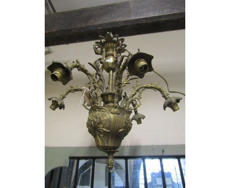 A heavy cast gilt metal hanging ceiling light with six swan neck acanthus branches, and further decorative foliate detail, 60