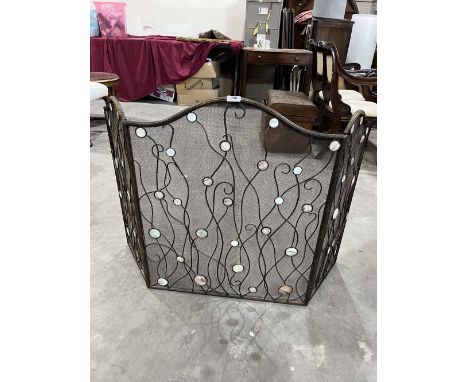 A triptych firescreen