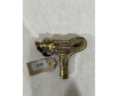 A Chinese dragon brass stick pommel