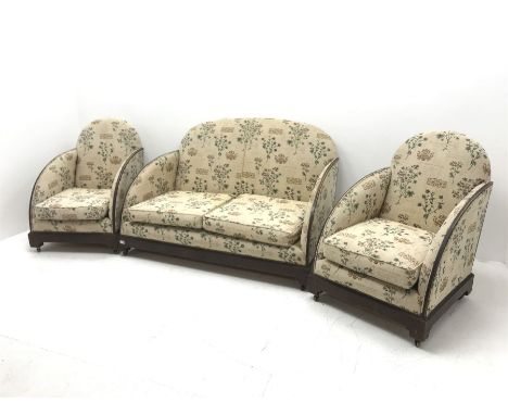 Art Deco period mahogany framed two seat settee, upholstered in a beige ground studded fabric with floral field (W134cm) and 