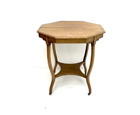 Early 20th century mahogany cross banded and inlaid octagonal centre table, shaped supports joined by undertierDimensions: He