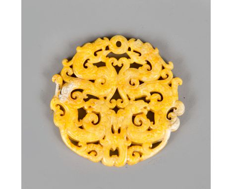 Chinese Jade Amulet, circular shape with open work, symbolizing dragons, finely sculpted, yellow colour with white incrustati